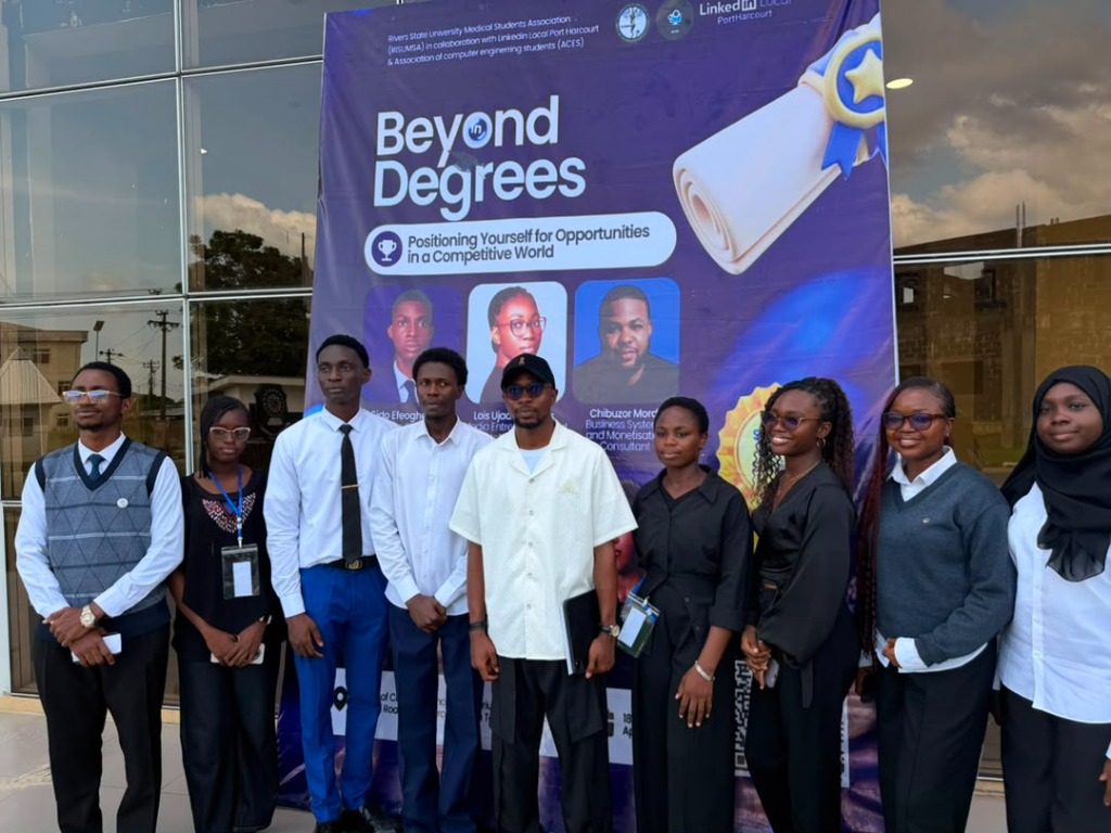 Christian Damiete Thankgod on stage with students at Rivers State University